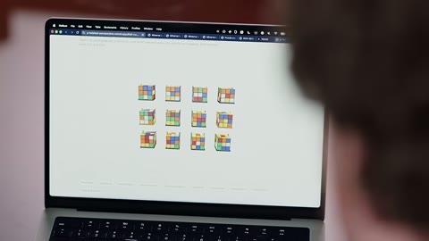 Source frame at 35.500s. Twelve colored cubes precede an answer page.